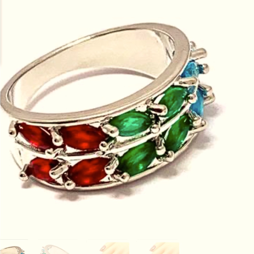 1.2k blue topaz emerald and ruby anniversary ring